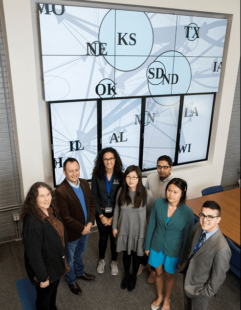 From left to right: Karen Garrett, John Hernandez Nopsa, Jeanelle Brisbane, Yanru Xing, Ravin Poudel, Si Lin Lei, Bryan Cordova